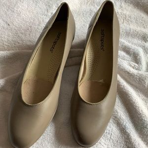 Soft spots tan colored shoes.